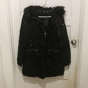 Black jacket with fur around the hood